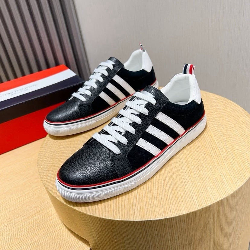 Three-Stripe Color-Block Sneaker — Red & Black Sole Detail