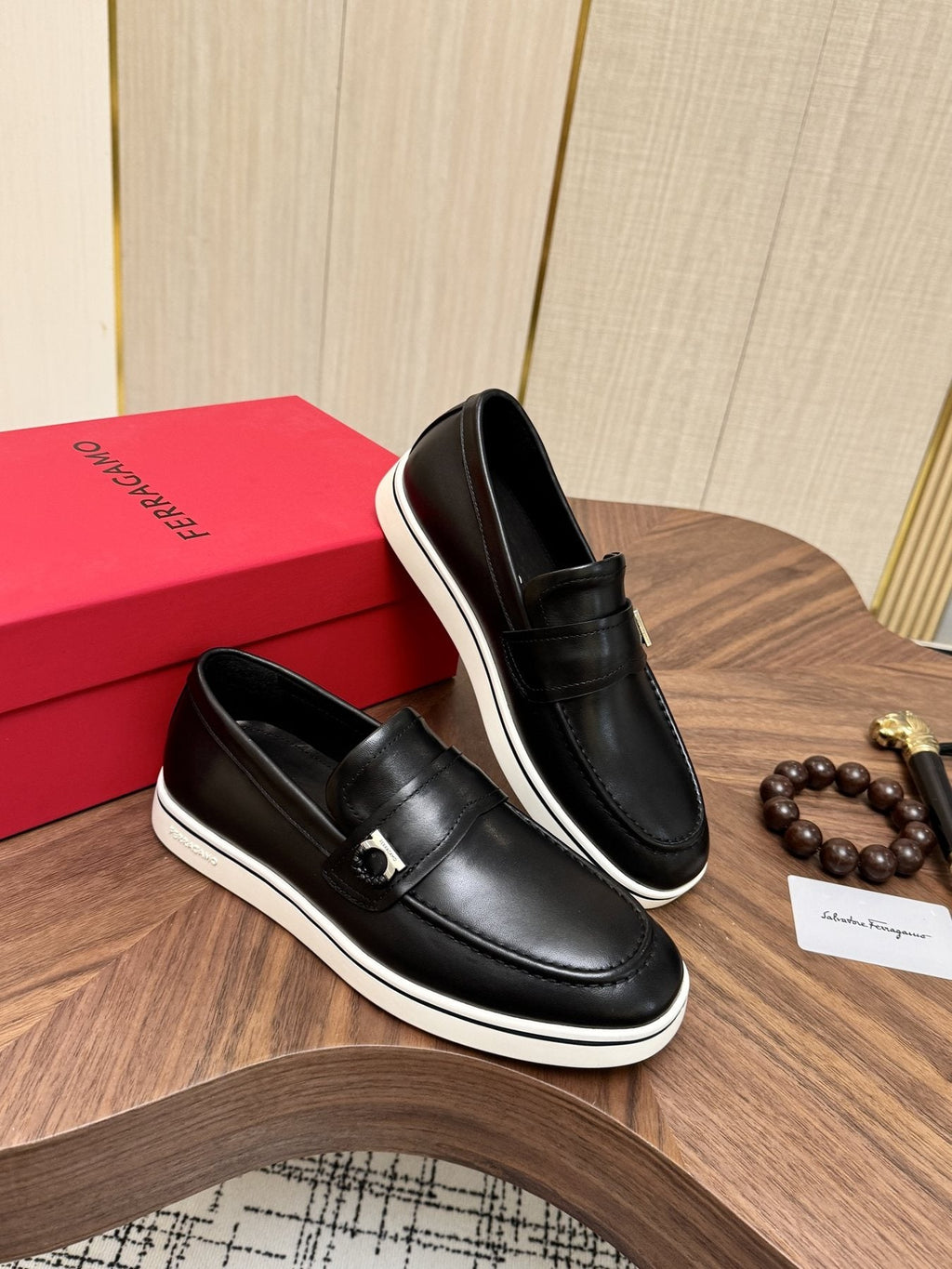 Salvatore Ferragamo Black Loafers with White Soles